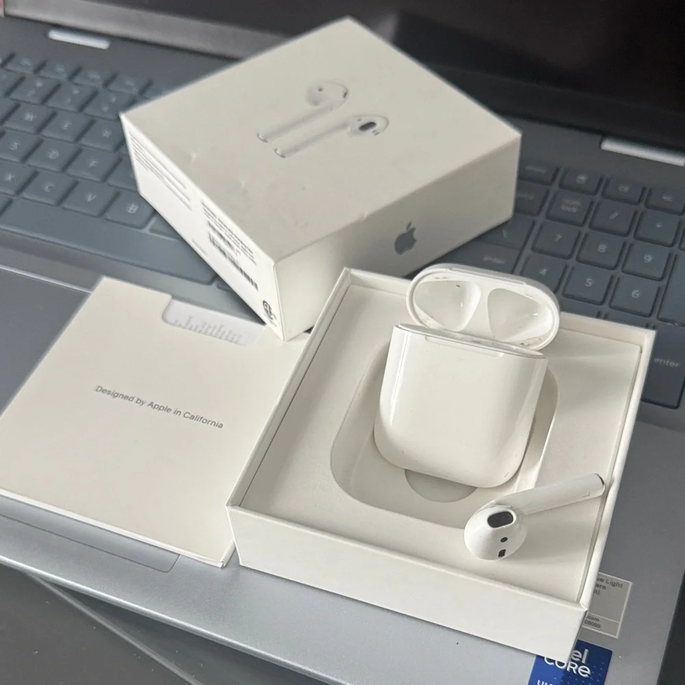Apple AirPods with Charging Case - White